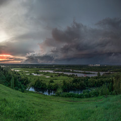 Storm clouds on the background of the summer sunset