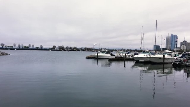 Pan Right of Boats Docked At McKinley Marina Milwaukee Lakefront Overcast Day