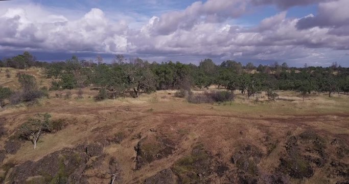 Stunning drone flyover of picturesque California foothills near Chico with Stratocumulus clouds
