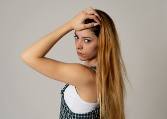 Fototapeta premium Beautiful woman model posing with beautiful hair and eyes. In beauty and fashion concept