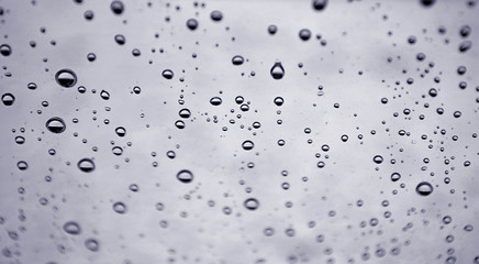 Drops of rain on glass