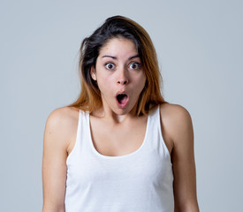 Happy young attractive woman shocked with surprised funny face. Human expressions