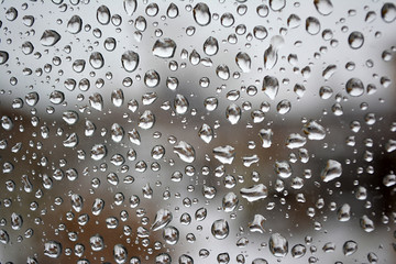 Drops of rain on glass