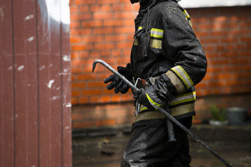 Fototapeta premium firefighters extinguish the fire house