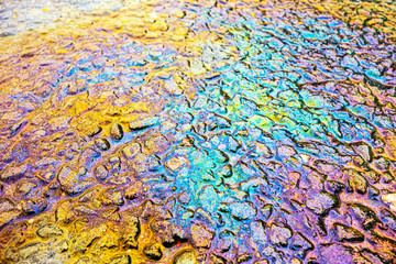 Oil Petrol Pollution Leak Rainbow Stain on Pavement