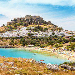 Fototapeta na wymiar Famous tourist attraction and landmark - Lindos town landscape. Travel and vacation destination in Rhodes island, Greece.