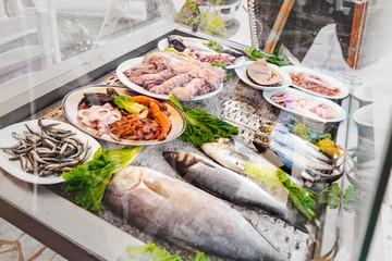 Assortment of fresh fish and seafood at the street market