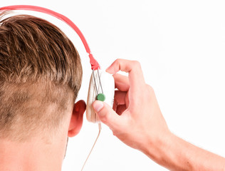 Fototapeta premium Modern technology. Buy music gadget. Shop store musical accessory gadgets. Music taste concept. Enjoy perfect music sound headphones. Sale discount. Man listening music headphones white background