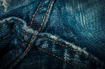 Closeup of Denim Jeans Crotch Point Double Stitched Seams. Denim Stitching Detail.