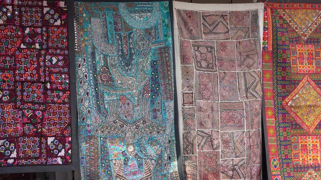 Patchwork carpet for sale in local market. Udaipur, Rajasthan, India. Close up