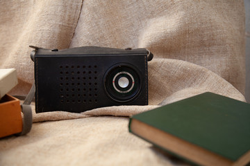 old soviet tape recorder on a flax texture background