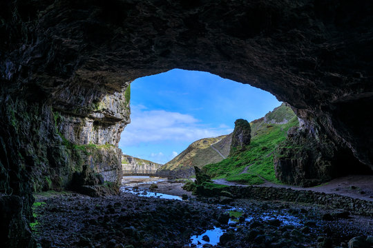 The view out of the entrance of Smoo Cave in Durness, Scotland, UK