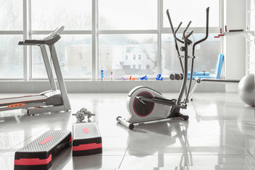 Interior of gym with modern equipment