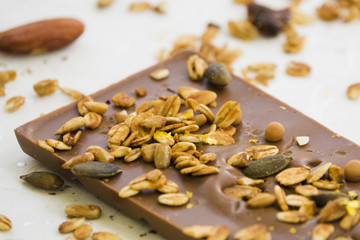 Dried fruits on chocolate bar