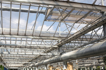 Air Condition pipe line system with glass ceiling. Ceiling air duct and light