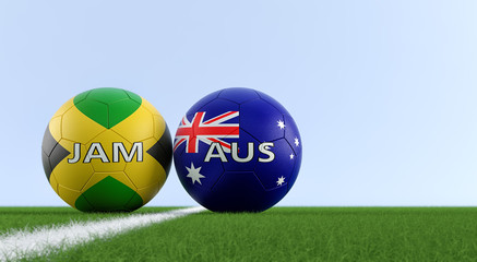 Jamaica vs. Australia Soccer Match - Soccer balls in Australia and Jamaica national colors on a soccer field. Copy space on the right side - 3D Rendering 