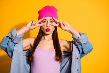 Naklejka premium Close up photo of romantic flirty lady have free time weekend vacation dressed modern clothing make v-sign isolated yellow bright background