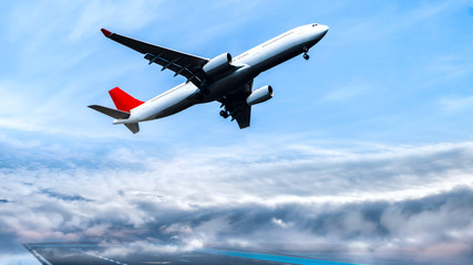 Airplane in the sky at sunrise . Plane Background Blue Sky White Clouds