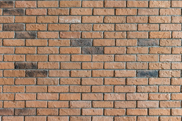 Obraz premium Rough texture red brick wall interior background in natural light.