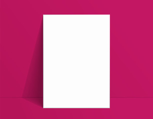 White poster mockup standing on the floor near pink color wall. Blank Canvas Mockup for design