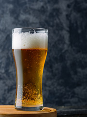 close-up of a misted glass of Pilsner beer