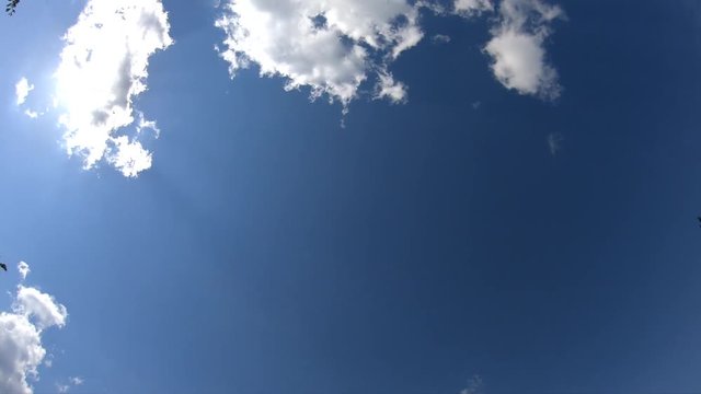 Timelapse clouds in the sky.Timelapse sun and clouds