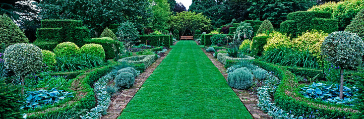 Panoramic view of the pattern border in the upper gardenof a country house garden