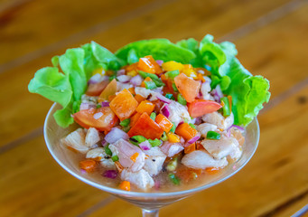 Ceviche in martini glass with lettuce garnish 