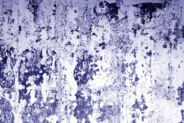 Сraked weathered cement wall texture in blue tone.