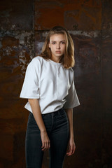 Fototapeta premium Test shooting for stylish young model wears jeans and shirt