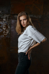 Test shooting for fashionable young model wears jeans and shirt