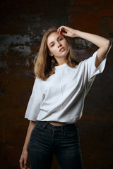 Fototapeta premium Test shooting for gorgeous young model wears jeans and shirt