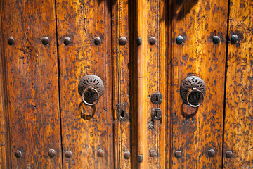 Fototapeta premium Background of antique wooden gate in Turkey,Antalya
