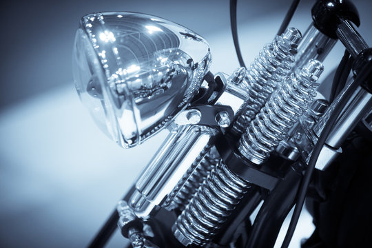 Motorcycle chrome headlight and front suspension