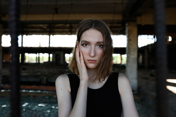 photo session with a young girl in a ruined building