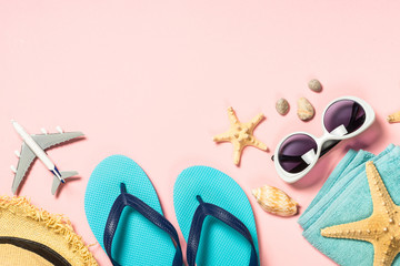 Summer cloth and accessories on pink.