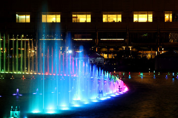KUALA LUMPUR, MALAYSIA, JANUARY 2017: a colorful singing fountain in the central park of the city at the Suria KLCC shopping mall