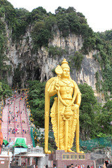 KUALA LUMPUR, MALAYSIA, JANUARY 2017: Batu caves. Large Hindu statue of the deity Murugan. This is the tallest statue of a Hindu deity in the world