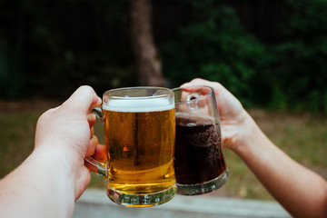 Latvian beer with latvian cheese and national folk belt