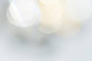 Abstract bokeh lights with soft light background