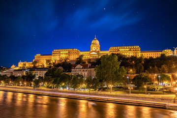 Naklejka premium View of Budapest Castle from Chain bridge over danube river, Hungary, at night