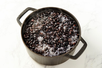 Fototapeta na wymiar Steamed rice with black beans 
