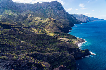 Fototapeta premium Playa de Guayedra beach, Tamadaba Natural Park on the coast of the ocean near Agaete, Las Palmas, Gran Canaria, Spain