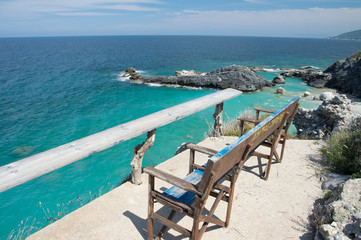 Milopotamos beach in Greece. Rocky cliffs and clear turquoise sea