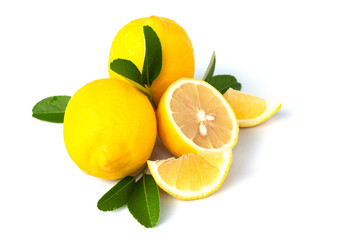 fresh lemon with lime and leaves on white background