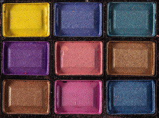 Colorful eye shadows palette. Makeup background. close up
