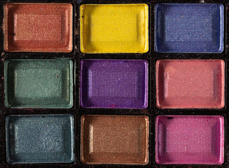 Colorful eye shadows palette. Makeup background. close up