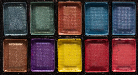 Colorful eye shadows palette. Makeup background. close up