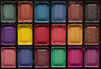 Colorful eye shadows palette. Makeup background. close up