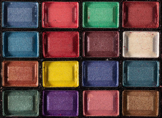 Colorful eye shadows palette. Makeup background. close up